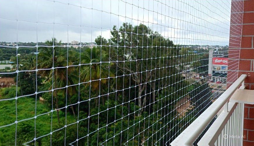 Building balcony area illustrating pigeon safety netting options from Jashuva Safety Nets